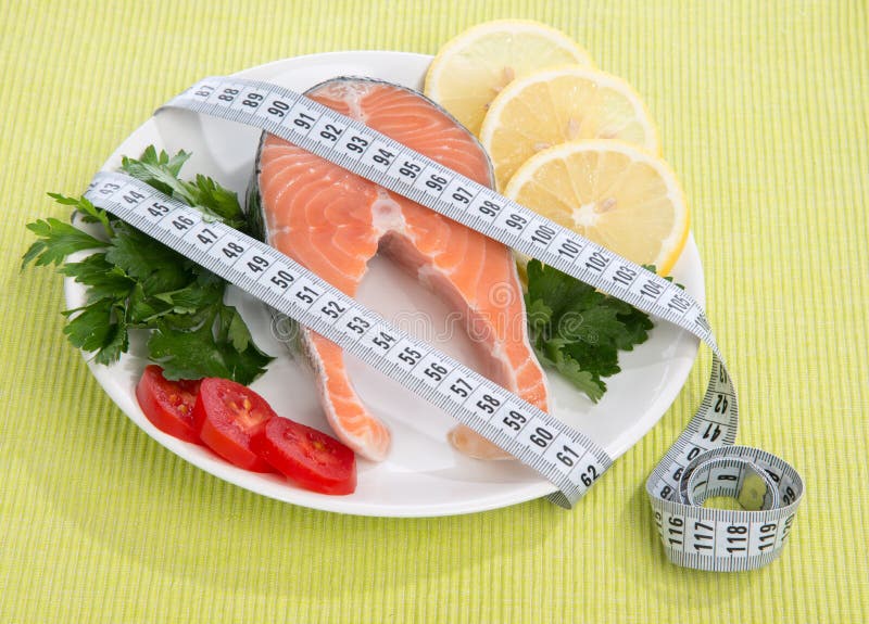 Diet weight loss concept. Fresh salmon steak
