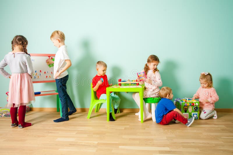 Different Age Kids at Homeschooling at Home or Daycare. Stock Image ...