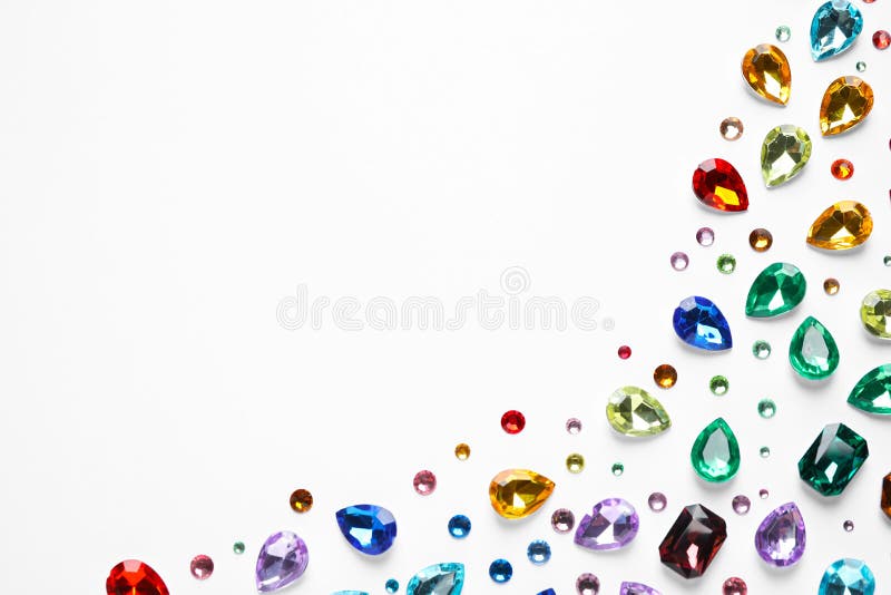 Different beautiful gemstones on white background stock images