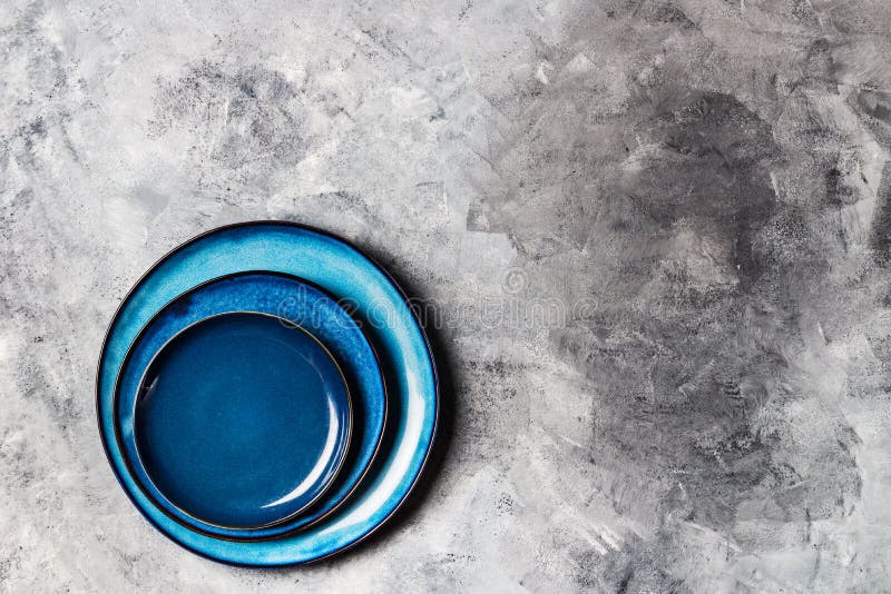Empty Blue Plates on Grey Background Stock Photo Image of clean