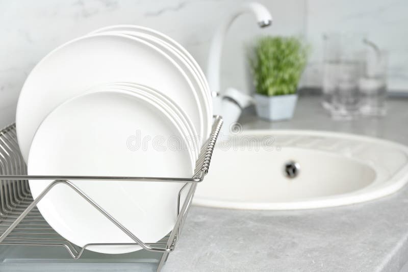 Different Clean Plates in Dish Drying Rack Stock Photo Image of