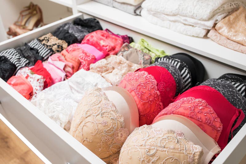 Different Color Bras in Drawer Stock Image - Image of brassiere