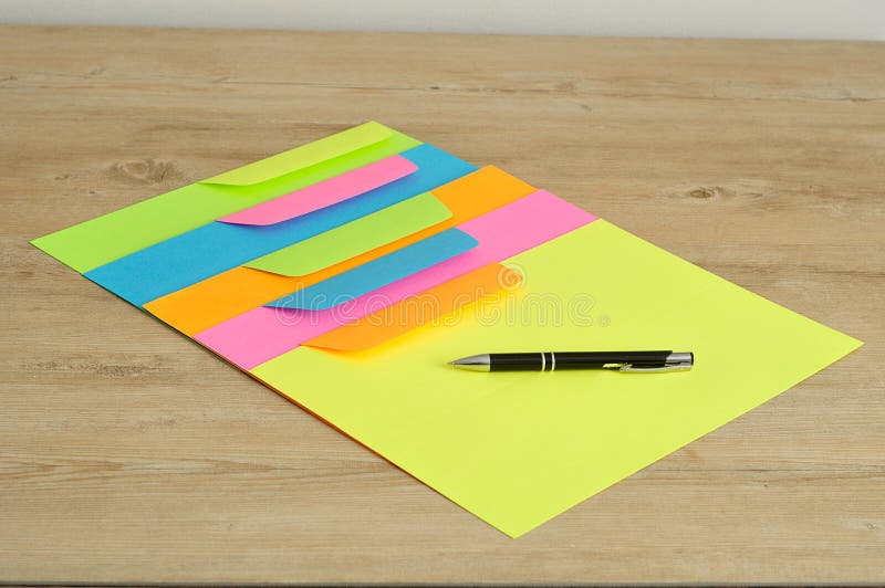 Different color papers and envelopes royalty free stock photo