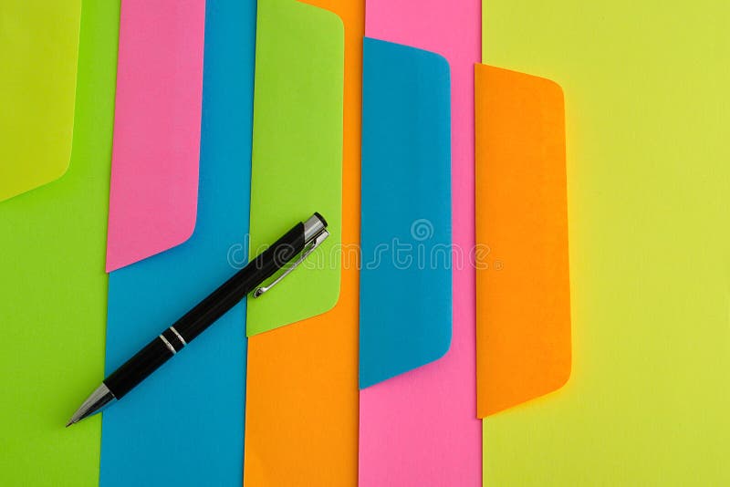 Different color papers and envelopes royalty free stock photography