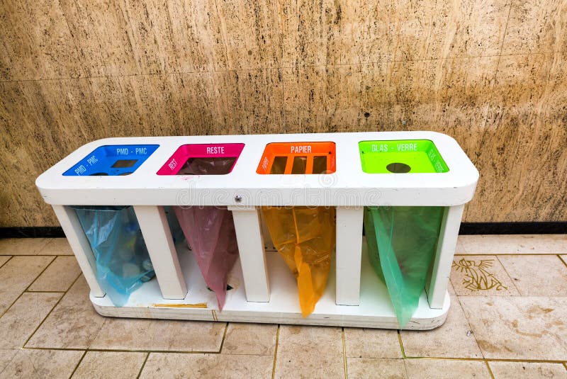 Different Colored Bins for Collection of Recycle Materials Stock Image