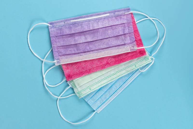 Different Colored Medical Masks on Blue Background Stock Image Image