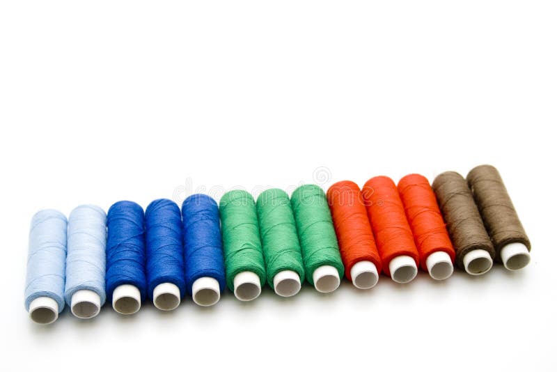 Different colored thread rolls