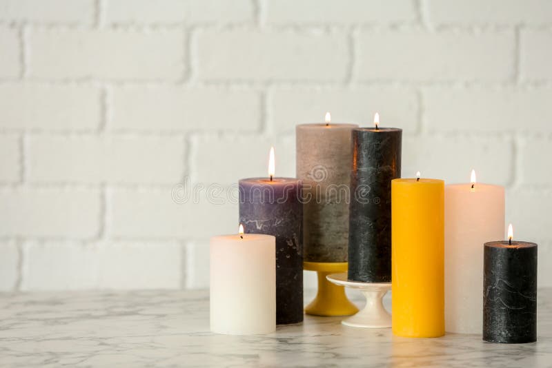 Different Decorative Wax Candles on Table Stock Photo Image of color