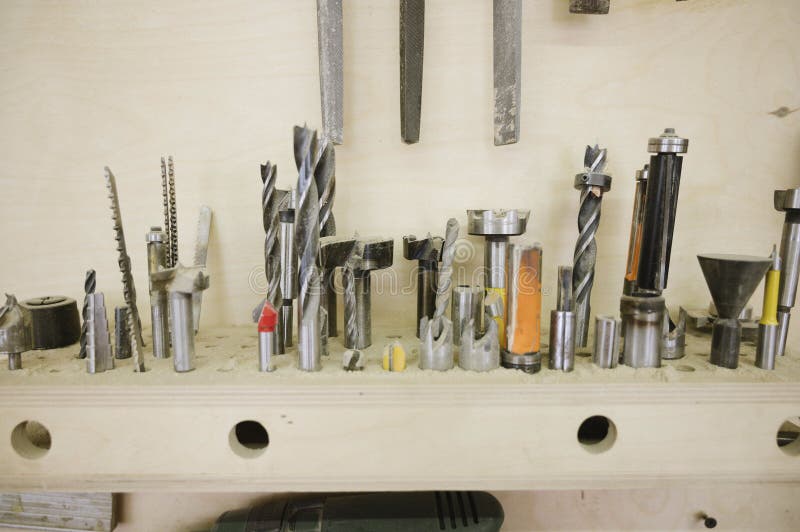 Different drills in the carpentry workshop stock photos