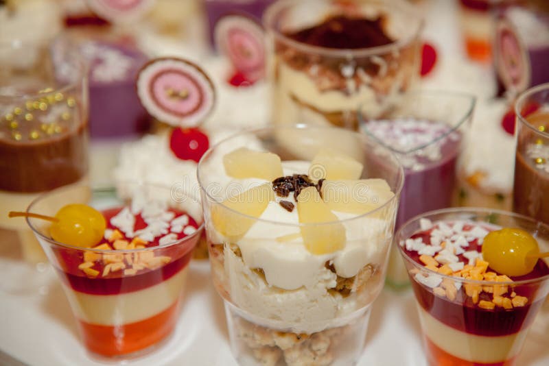 Different Fruit Desserts with Fruits in Glasses on the Table ...