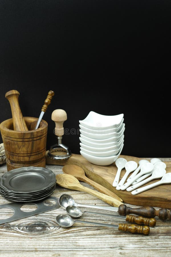 Different Kitchen Accessories from Tin, Olive Wood and Ceramic Stock