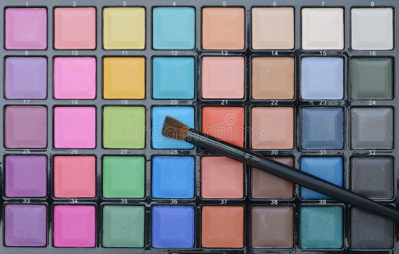 Different Makeup Cosmetics on Rustic White Wooden Table. Stock Image