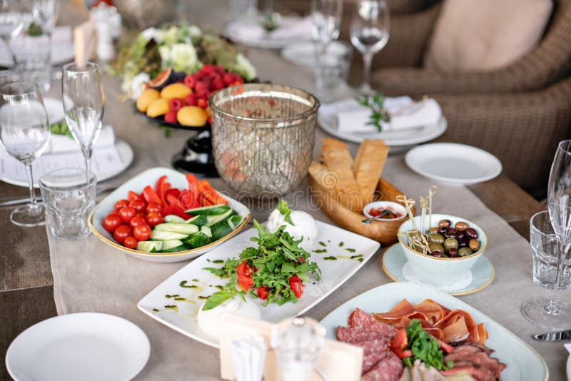 Different Meals for the Guests on Banquet Table. Delicious Dishes on