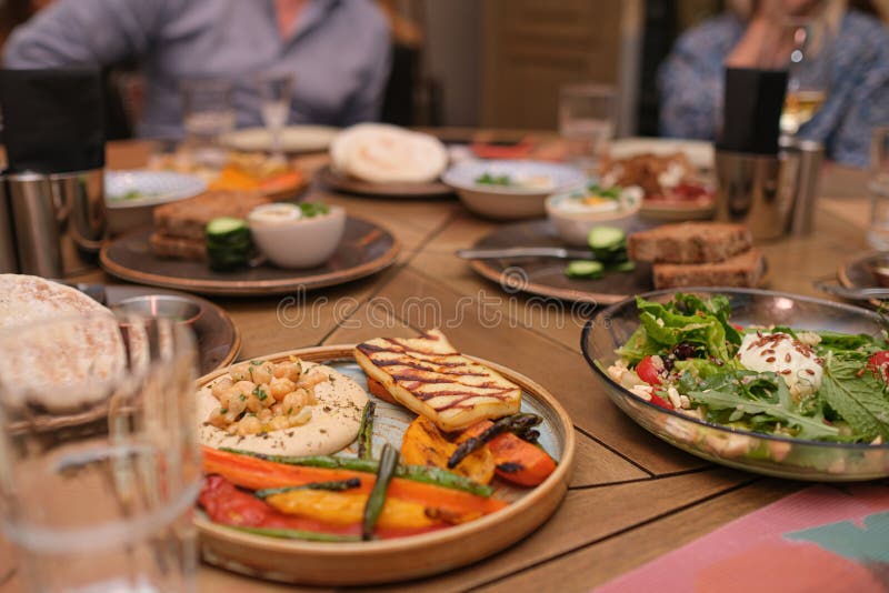 Different Meals for the Guests on the Restaurant Table Stock Image