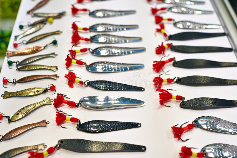 Different metal fishing lure on white stock photos Different metal fishing lure on white stock photos