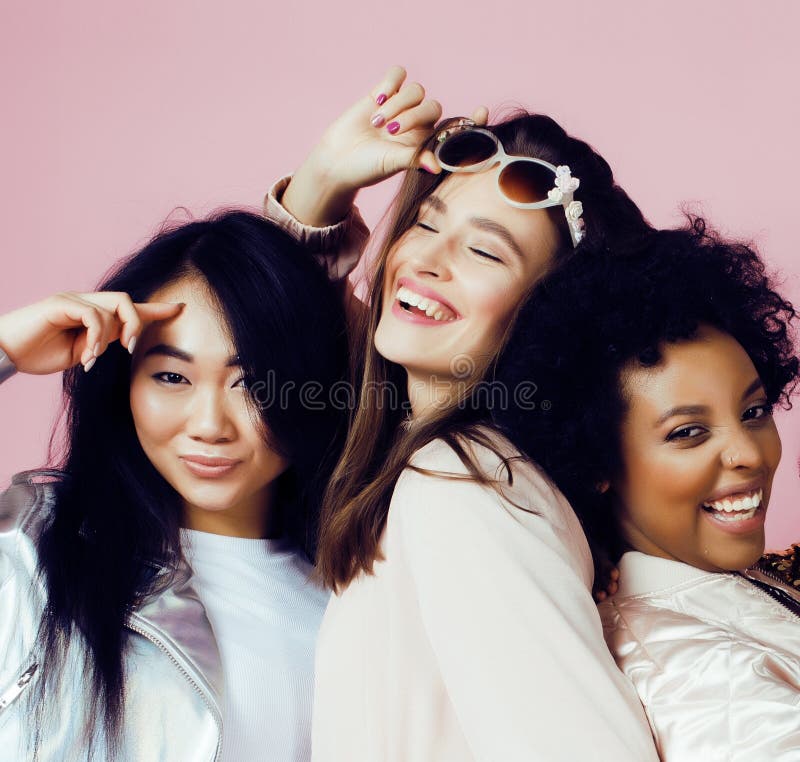 Different nation girls with diversuty in skin, hair. Asian, scandinavian, african american cheerful emotional posing on