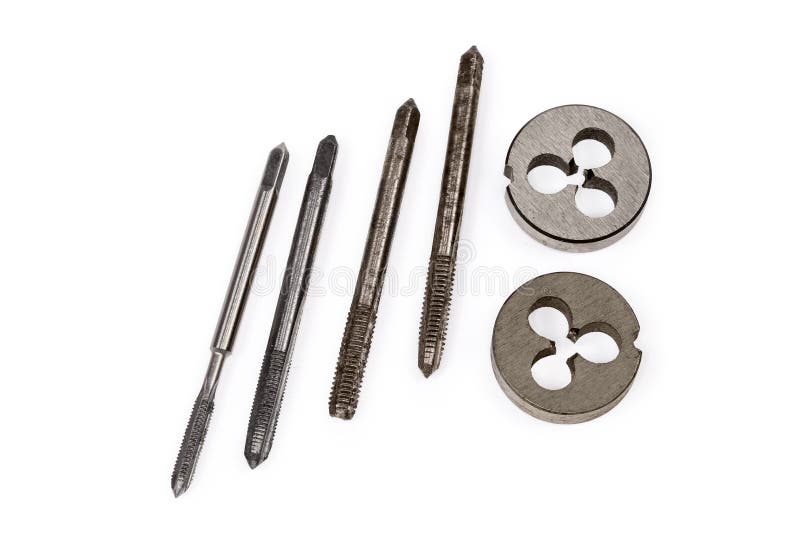 Different Old Thread Cutting Plug Taps and Dies, Closeup Stock Photo