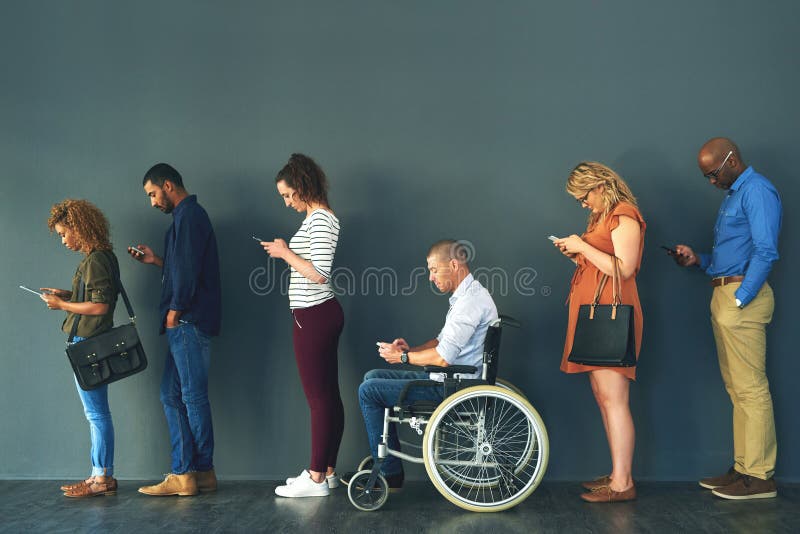 Different People but with the Same Habits. a Group of People Standing