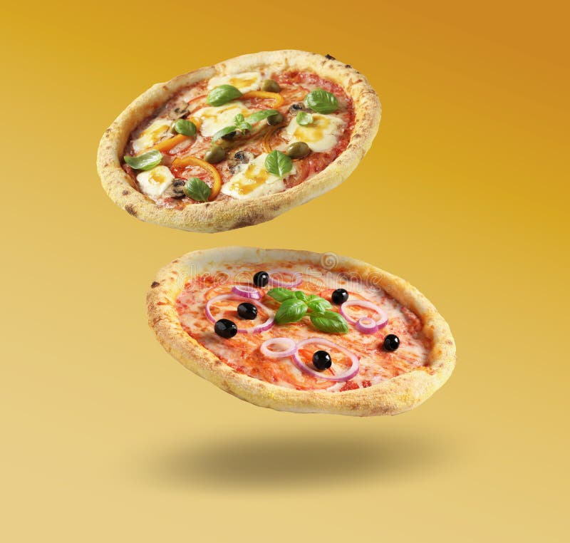 Different pizzas in air on orange gradient background stock images