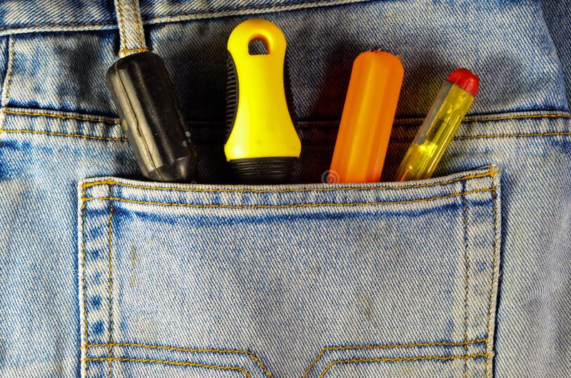 Different Screwdrivers in a Pocket of the Jeans Stock Photo Image of