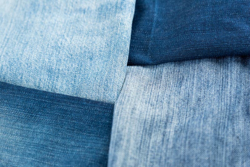 Different Shades of Blue Denim Fabric. Detail of Several Layers of ...