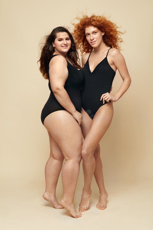 Plus Size Models. Full-figured Women in Black Bodysuits Full-length  Portrait. Brunette and Blonde Posing on Beige Background Stock Image -  Image of concept, female: 183623255