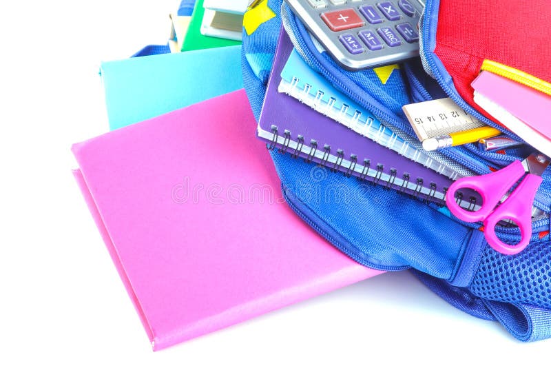 Different stationery and school supplies lying in a school backpack on a white isolated background royalty free stock photos