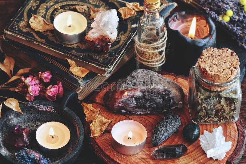 Different types of crystals on wiccan witch altar royalty free stock photos