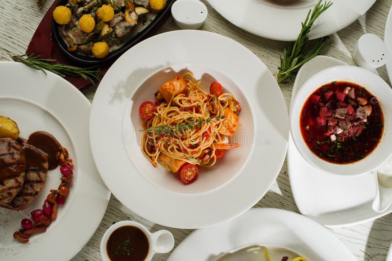 Different Types of Dishes on the Table, Top View. Concept for Re Stock