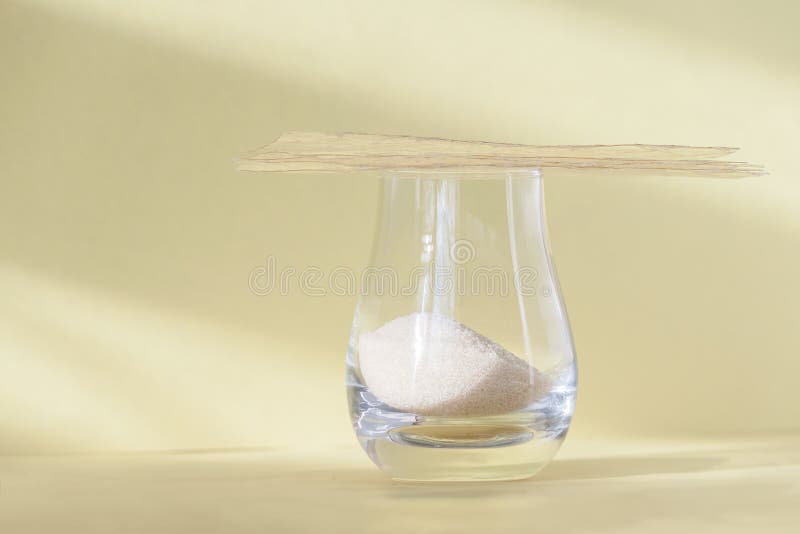 Different Types of Gelatin Powder and Sheets on White Table Stock Image