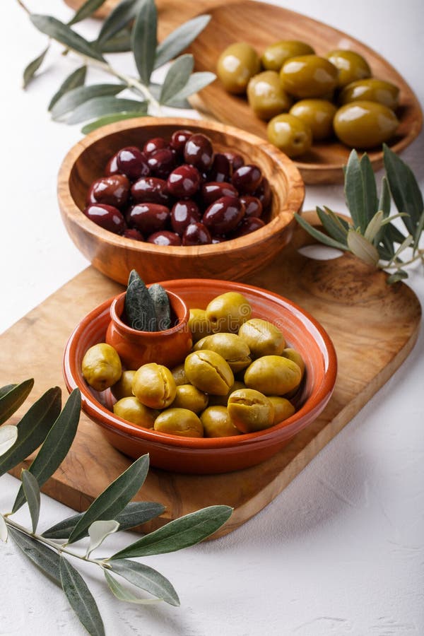 Different Types of Olives Green and Black in Bowls on White Table Stock Photo Image of organic