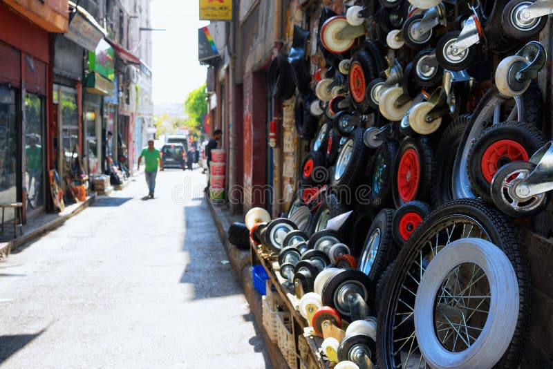 Turkish shop selling different types of wheels on a summer day in a shopping street Istanbul. Turkish shop selling different types of wheels on a summer day in a shopping street Istanbul