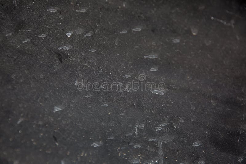 White Spots on Black Glass for Texture and Design Stock Photo Image