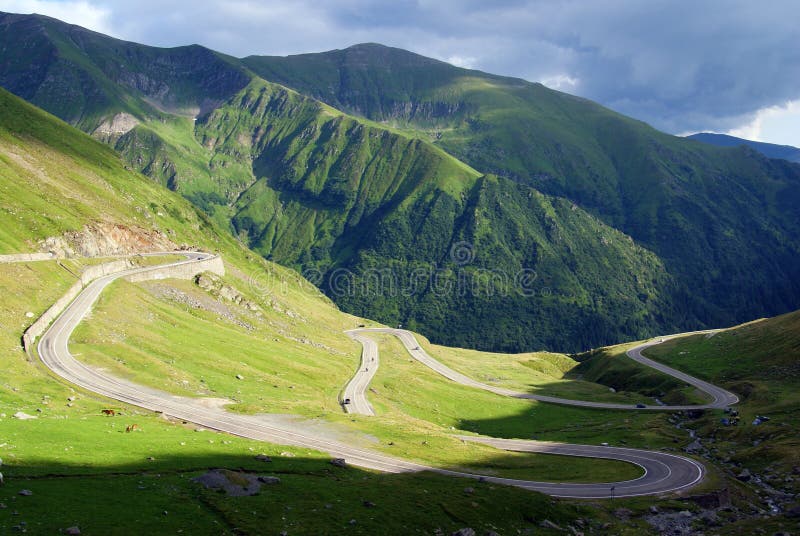 Difficult curved road in mountains