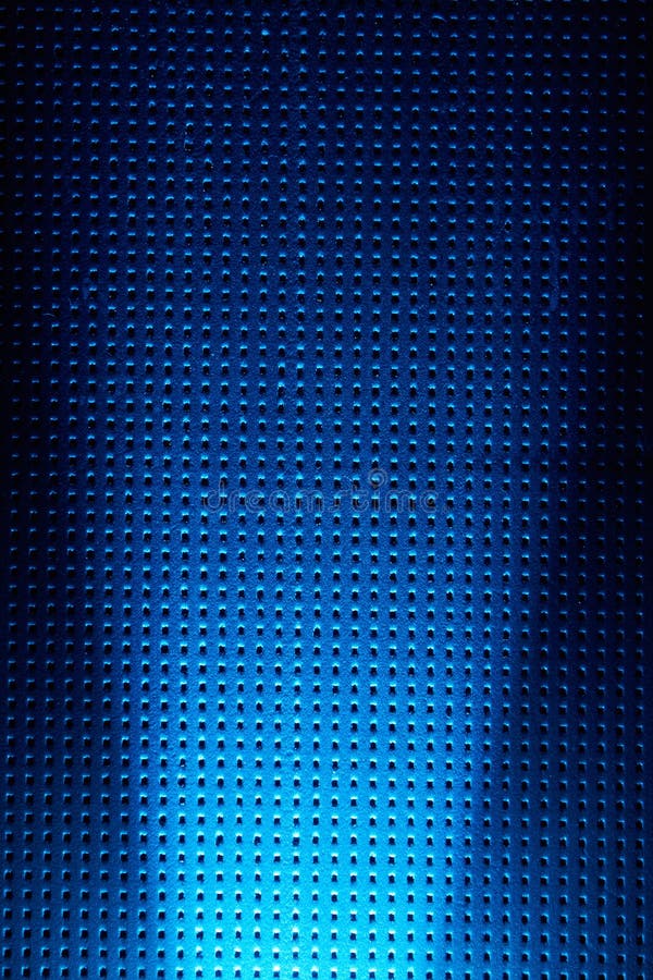 Diffused bright beam of light on a light blue background in a black dot stock photos