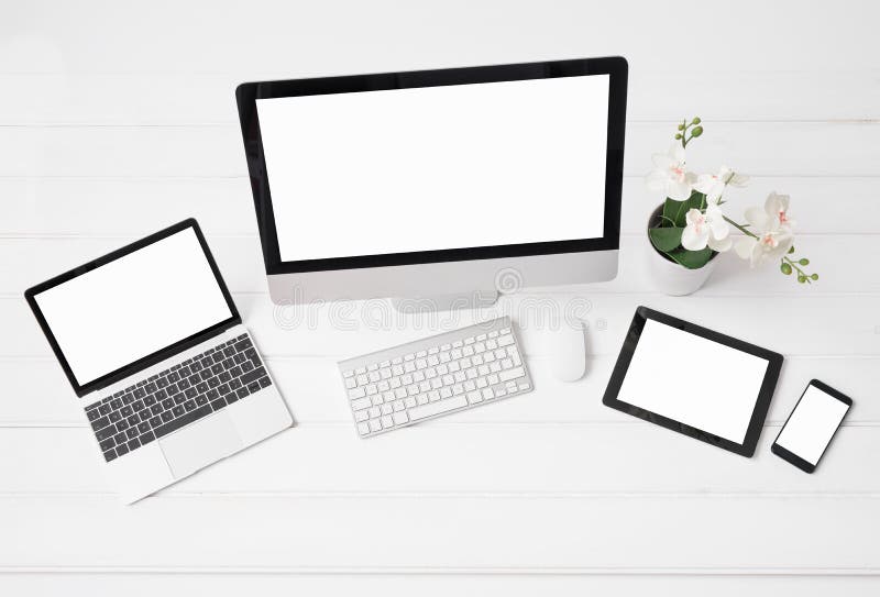 Différent classé du bureau et les ordinateurs portables, le comprimé et le téléphone image stock Différent classé du bureau et les ordinateurs portables, le comprimé et le téléphone image stock