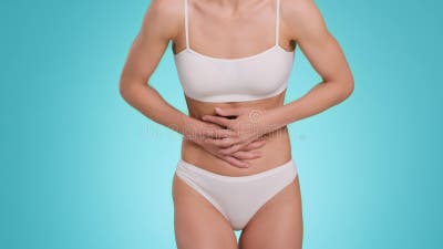 Digestive System Problems. Unrecognizable Woman in Underwear Bursting  Balloon, Suffering from Stomach Ache Stock Footage - Video of painful,  injured: 253674376