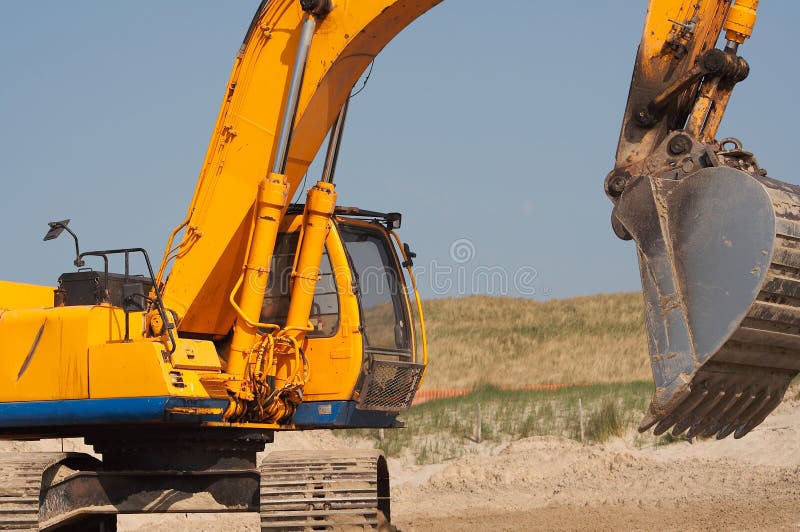 Closeup shot of earth moving/digger. Landscape view. Closeup shot of earth moving/digger. Landscape view.