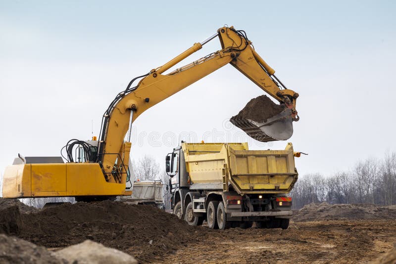 Digger Loading Trucks with Soil Stock Image Image of site, equipment