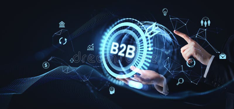 A digital B2B concept image shows hands interacting with holographic icons on a dark background. Represents business technology stock image