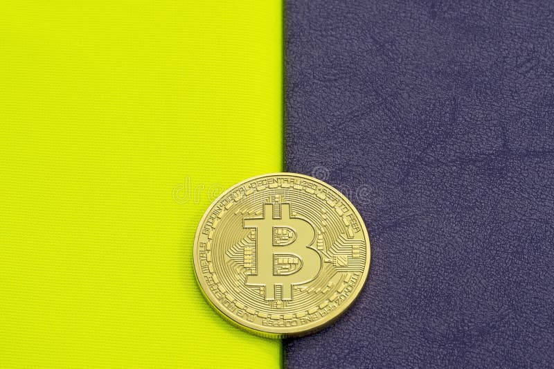 Digital bitcoin on a acid on a purple background. stock photo Digital bitcoin on a acid on a purple background. stock photo