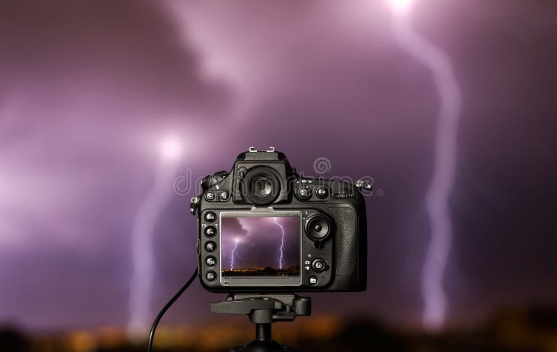 Camera On Night City Background. Concept On The Topic Of Media Stock