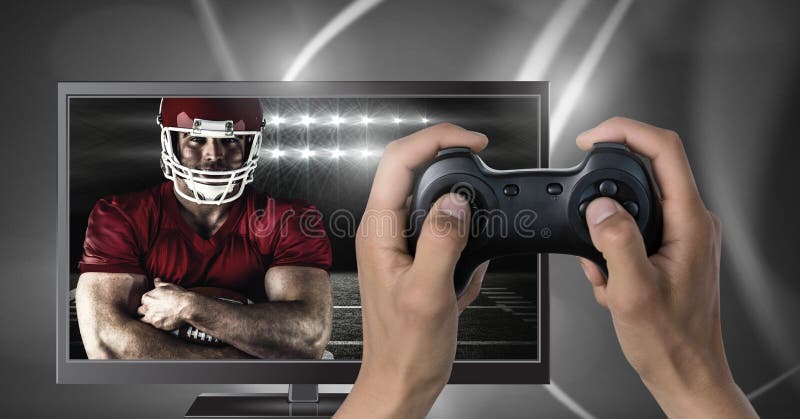 Playing American football computer game with controller in hands