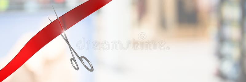 Scissors cutting ribbon with blurred background royalty free stock photography Scissors cutting ribbon with blurred background royalty free stock photography
