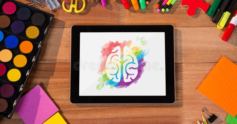 Tablet on a school table with colored brain on screen royalty free stock photography Tablet on a school table with colored brain on screen royalty free stock photography