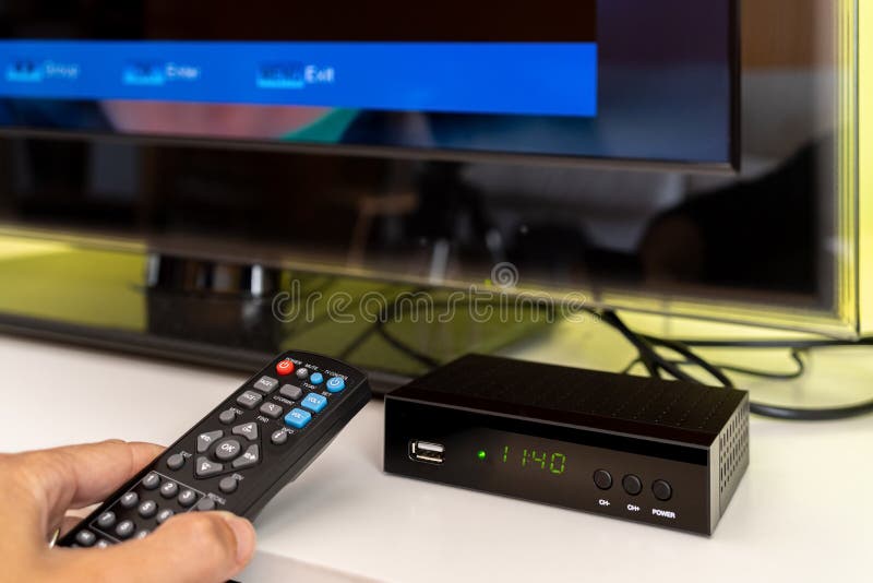 Digital Decoder with Remote Control and Television Monitor. Stock Photo