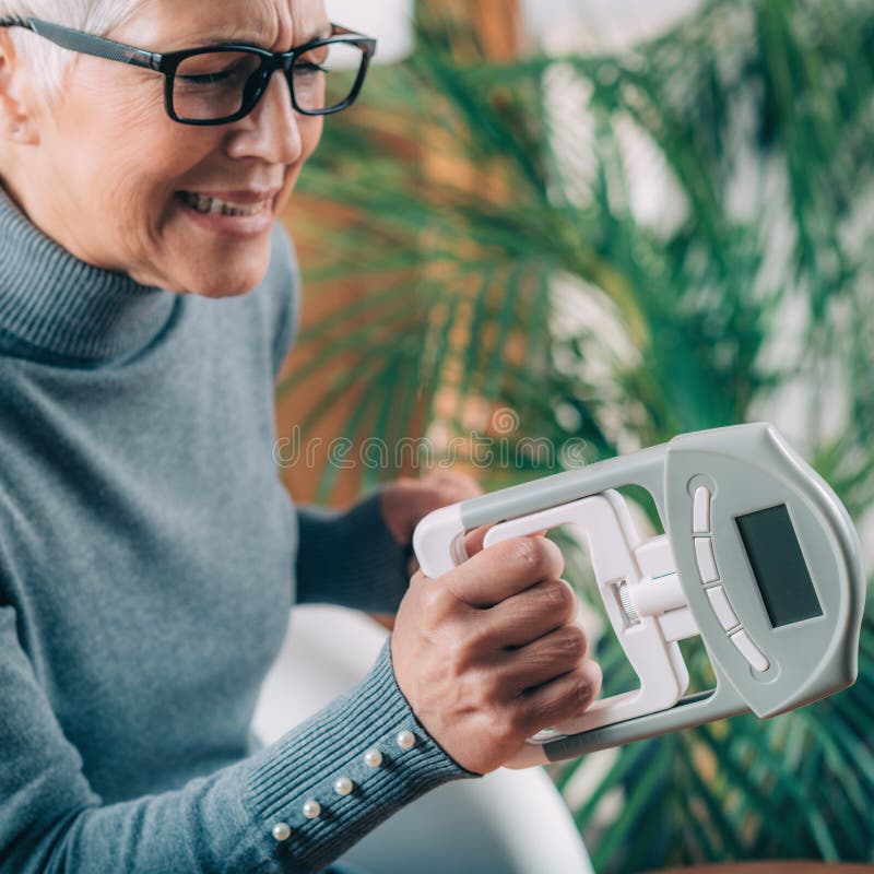 Digital Hand Grip Dynamometer for Strength Measurement Stock Photo