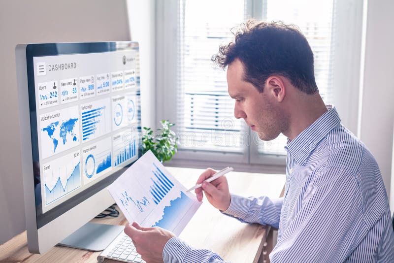Digital marketing analytics technology with metrics and key performance indicators dashboard on computer screen, person analyzing royalty free stock photo