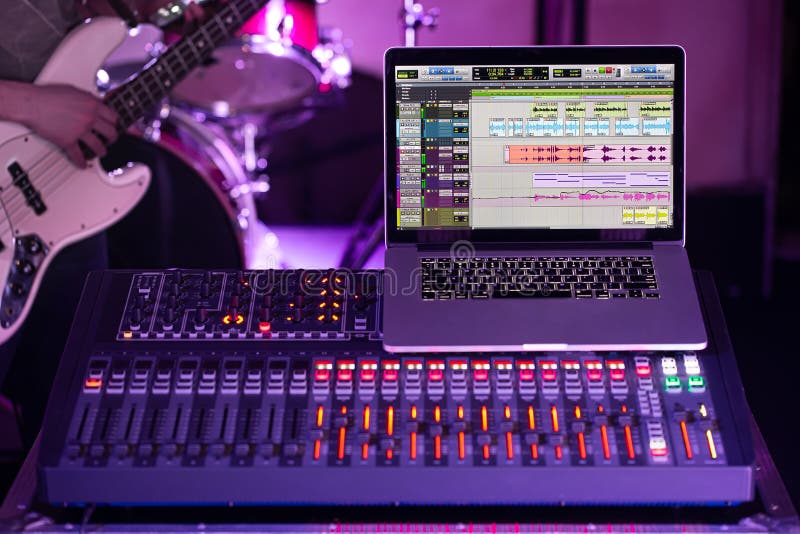 Digital Mixer in a Recording Studio , with a Computer for Recording