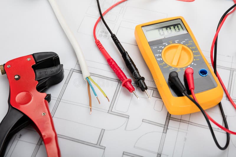 Digital Multimeter On Blueprint stock image